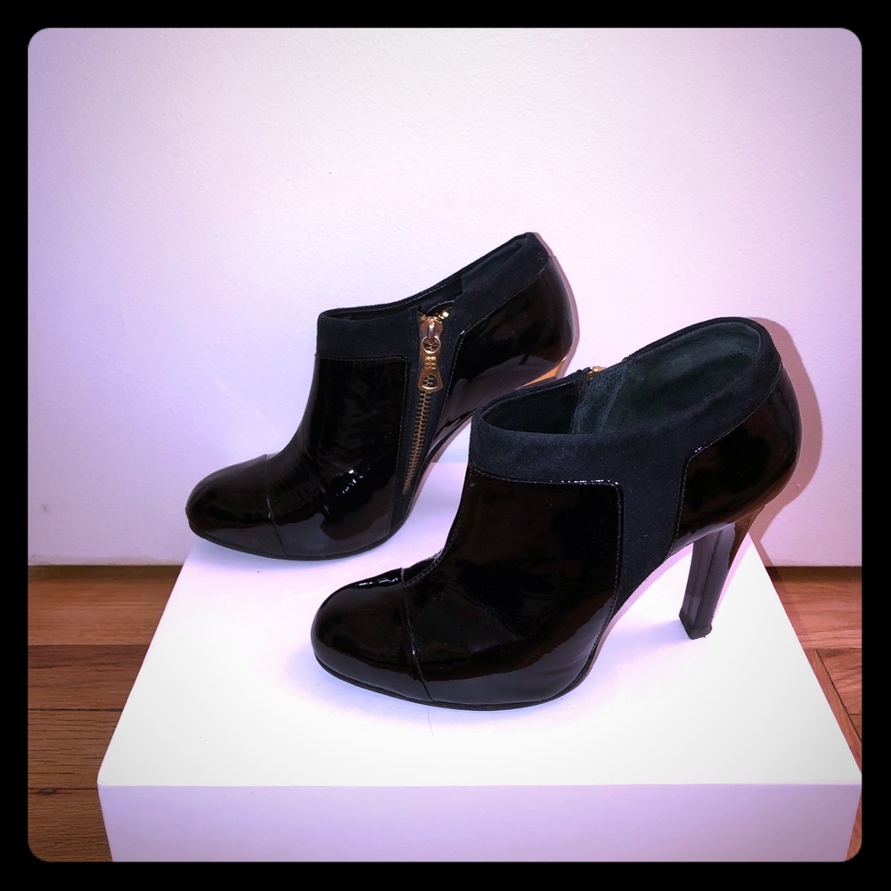 BCBG Black patent booties with gold detail